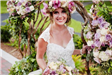 Bride with Floral Boutique Wedding Arch