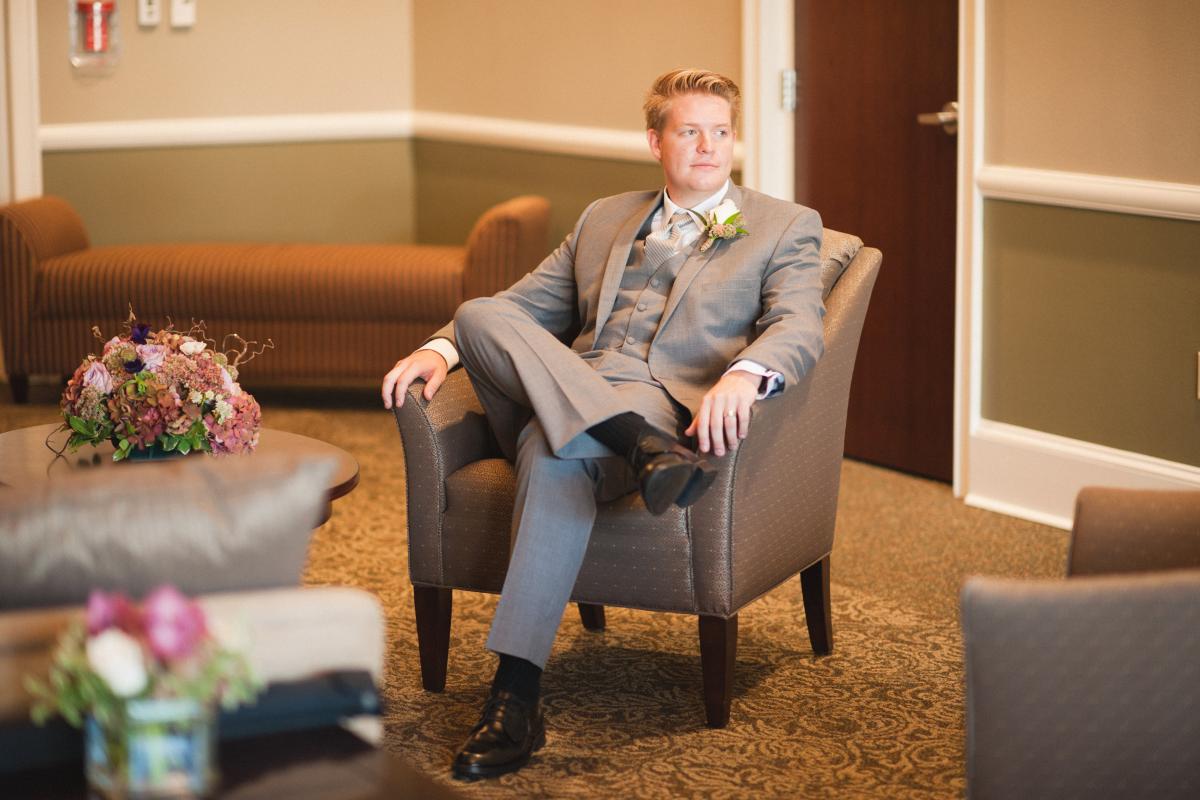 Groom Seated in Chair